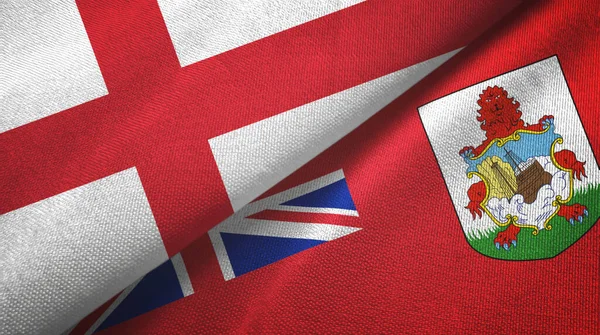Engeland en Bermuda twee vlaggen textiel doek, stof textuur — Stockfoto