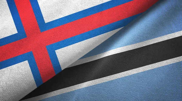 Faroe Islands and Botswana two flags textile cloth, fabric texture — Stock Photo, Image