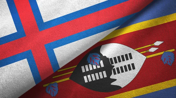 Фарерські острови і Свазіленд два прапори текстильного полотна — стокове фото