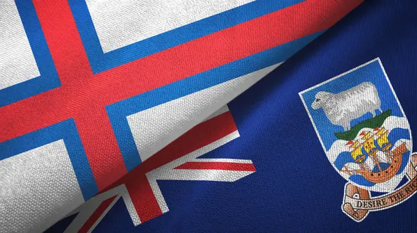 Фарерские острова и Фолклендские острова два флага текстильная ткань, текстура ткани — стоковое фото