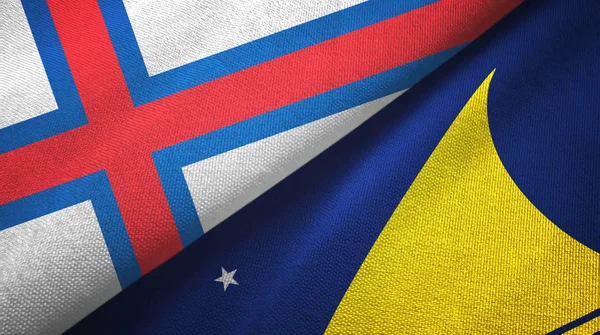 Ilhas Faroé e Tokelau duas bandeiras pano têxtil, textura de tecido — Fotografia de Stock