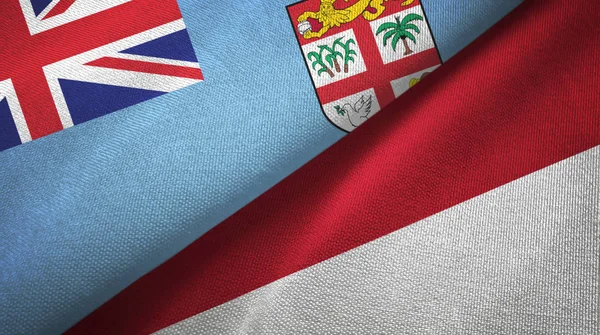 Fiji e Indonesia dos banderas tela textil, textura de la tela —  Fotos de Stock