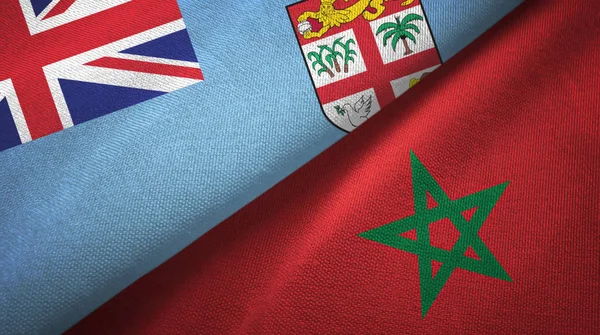 Fiji en Marokko twee vlaggen textiel doek, stof textuur — Stockfoto
