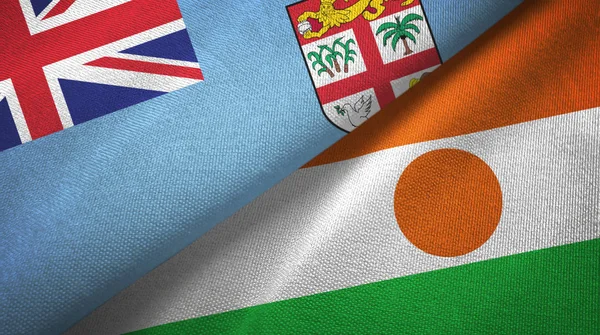 Fiji and Niger two flags textile cloth, fabric texture — Stock Photo, Image