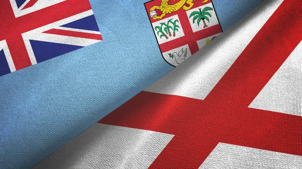 Fiji och Nordirland två flaggor textilduk, textur — Stockfoto