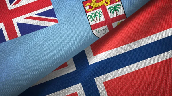 Fiji en Noorwegen twee vlaggen textiel doek, stof textuur — Stockfoto