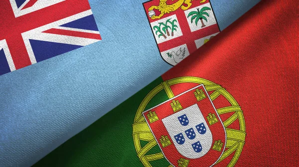 Fiji och Portugal två flaggor textilduk, tyg struktur — Stockfoto