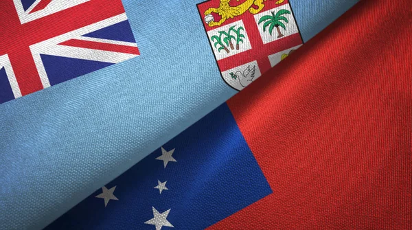 Fiji and Samoa two flags textile cloth, fabric texture — стокове фото