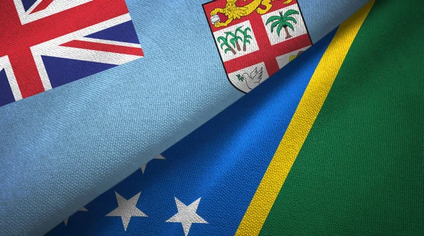 Fiji and Solomon Islands two flags textile cloth, fabric texture