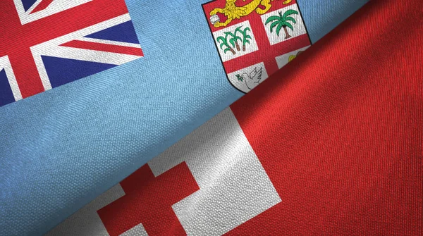 Fiji y Tonga dos banderas tela textil, textura de la tela — Foto de Stock