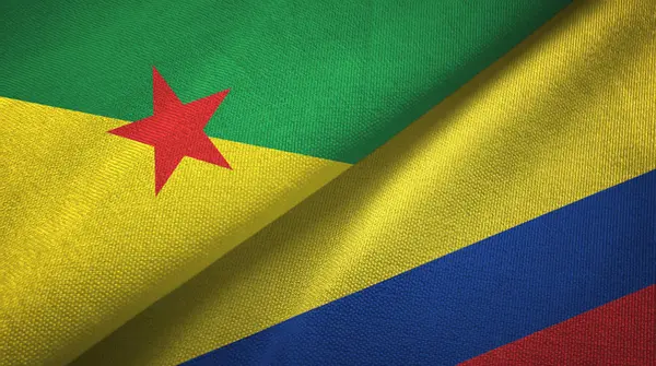 Frans-Guyana en Colombia twee vlaggen textiel doek, stof textuur — Stockfoto