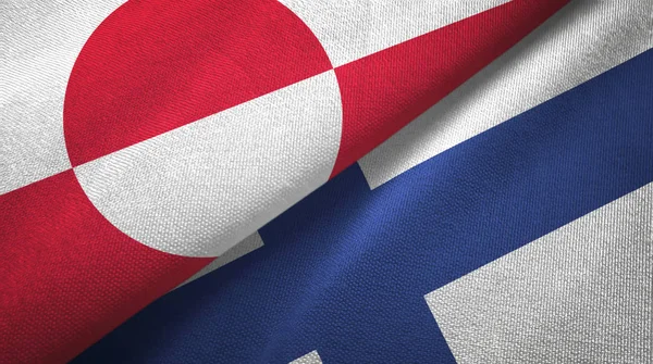 Grenlandia i Finlandia dwie flagi tkaniny tekstylne, tekstura tkaniny — Zdjęcie stockowe