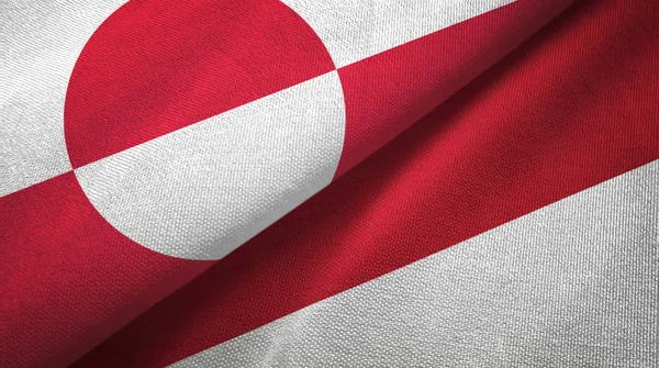 Grenlandia i Indonezja dwie flagi tkaniny tekstylne, tekstura tkaniny — Zdjęcie stockowe