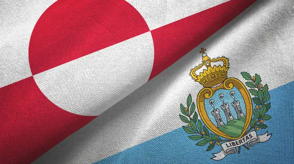 Greenland and San Marino two flags textile cloth, fabric texture — ストック写真