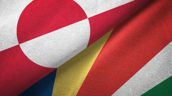 Greenland and Seychelles two flags textile cloth, fabric texture — ストック写真
