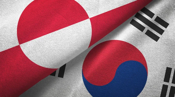 Groenlandia e Corea del Sud due bandiere tessuto, tessitura tessuto — Foto Stock