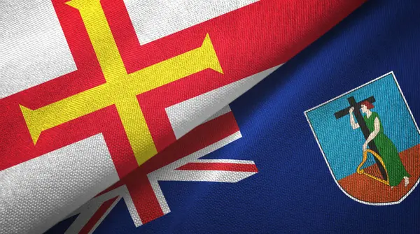 Guernsey y Montserrat dos banderas tela textil, textura de la tela — Foto de Stock