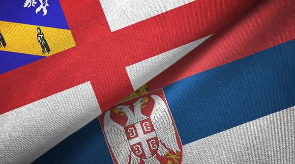 Herm y Serbia dos banderas tela textil, textura de la tela —  Fotos de Stock
