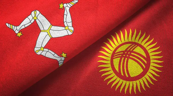 Isla de Mann y Kirguistán dos banderas tela textil, textura de la tela — Foto de Stock