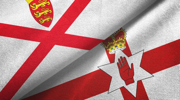 Jersey και τη Βόρεια Ιρλανδία δύο σημαίες ύφασμα, υφάνσιμες ίνες — Φωτογραφία Αρχείου