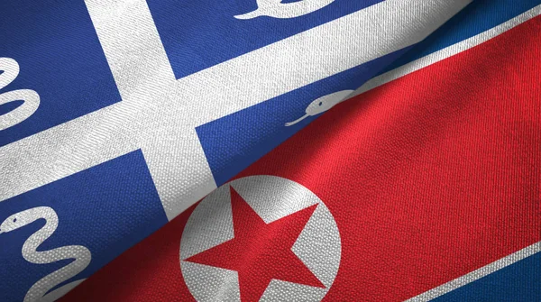 Martinique snake and North Korea two flags textile cloth, fabric texture — Stock Photo, Image