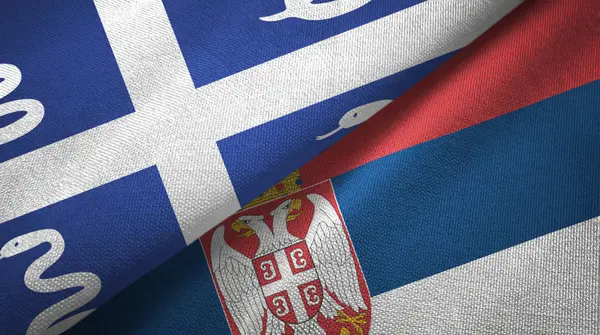 Мартиника змея и Сербия два флага текстильная ткань, текстура ткани — стоковое фото