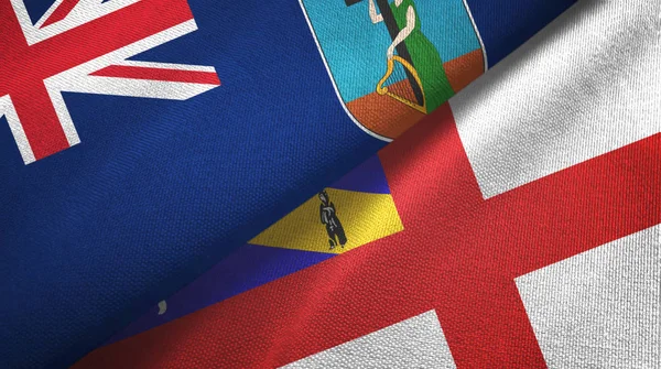 Montserrat en Herm twee vlaggen textiel doek, stof textuur — Stockfoto