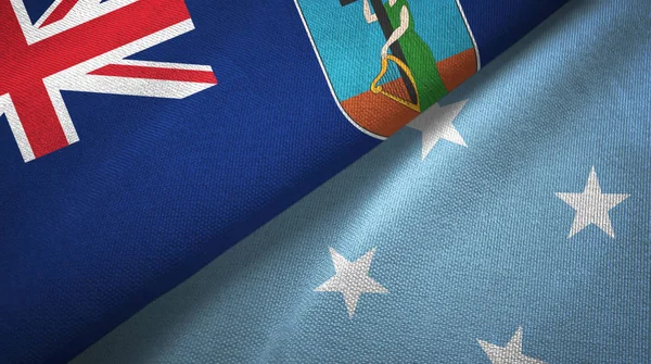 Montserrat y Micronesia dos banderas tela textil, textura de la tela — Foto de Stock