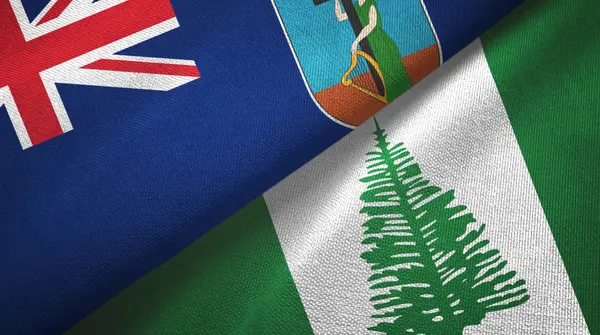 Montserrat y Norfolk Island dos banderas tela textil, textura de la tela — Foto de Stock