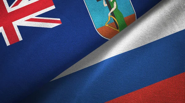 Montserrat und russland zwei flaggen textiltuch, textur — Stockfoto