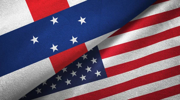 Antille olandesi e Stati Uniti due bandiere tessuto, tessitura tessuto — Foto Stock