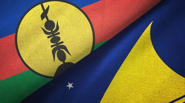 Νέα Καληδονία και Tokelau δύο σημαίες ύφασμα, υφασμάτινη υφή — Φωτογραφία Αρχείου