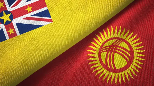 Niue y Kirguistán dos banderas tela textil, textura de la tela — Foto de Stock
