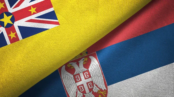 Niue and Serbia two flags textile cloth, fabric texture — Stock Photo, Image