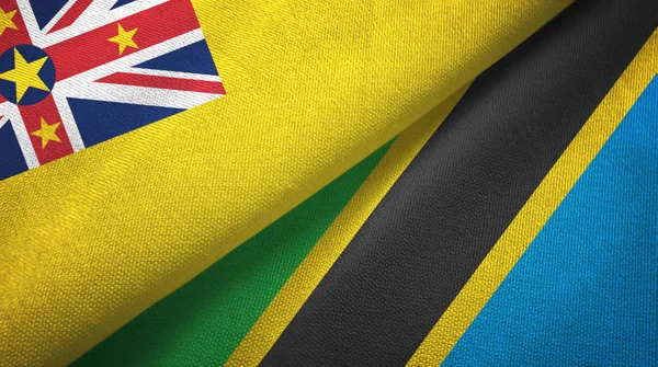 Niue and Tanzania two flags textile cloth, fabric texture