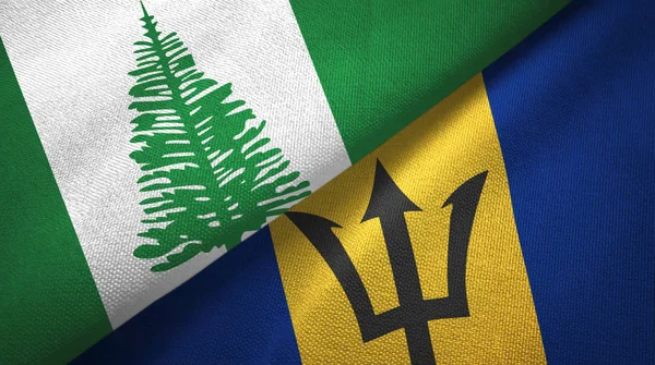 Νήσος Νόρφολκ και Μπαρμπάντος δύο σημαίες ύφασμα, υφασμάτινη υφή — Φωτογραφία Αρχείου