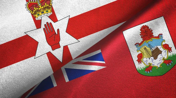 Irlanda del Norte y Bermudas dos banderas tela textil, textura de la tela — Foto de Stock