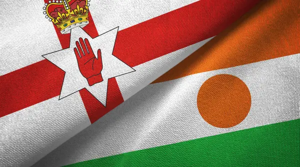 Northern Ireland and Niger two flags textile cloth, fabric texture — Stock Photo, Image