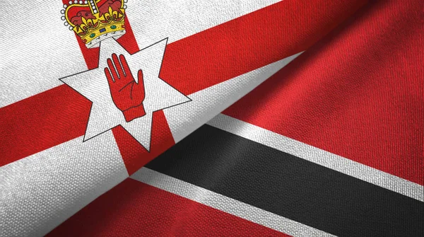 Noord-Ierland en Trinidad en Tobago twee vlaggen textieldoek, textieltextuur — Stockfoto