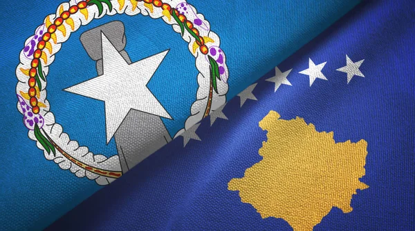 Islas Marianas del Norte y Kosovo dos banderas tela textil, textura de la tela — Foto de Stock