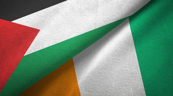 Palesztina és Elefántcsontpart Elefántcsontpart két zászló textilszövet textúra — Stock Fotó