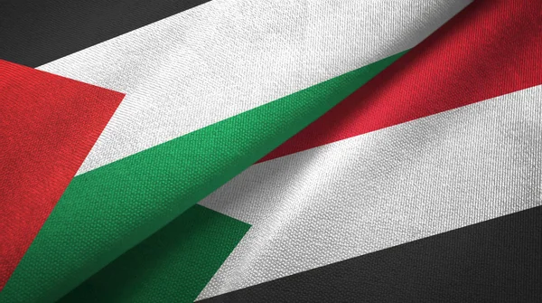 Filistin ve Sudan 'da iki bayrak, tekstil kumaş, kumaş. — Stok fotoğraf