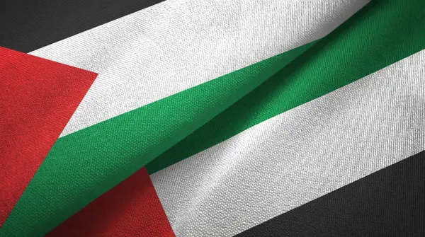 Palestine and United Arab Emirates two flags textile cloth, fabric texture — Stock Photo, Image
