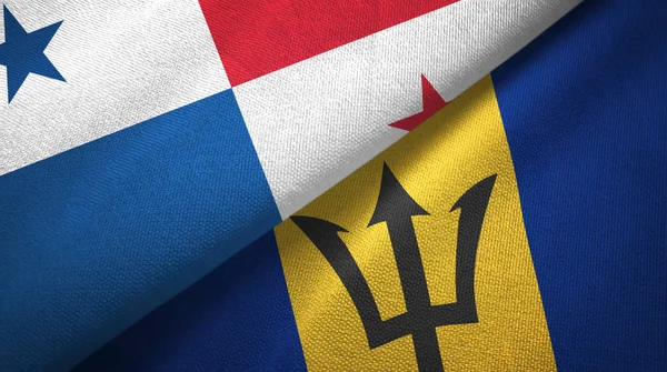 Panama en Barbados twee vlaggen textiel doek, stof textuur — Stockfoto