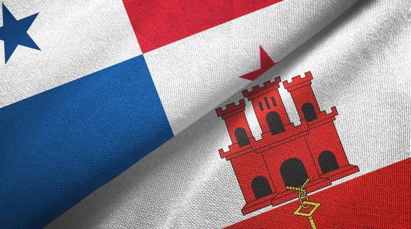 Panamá y Gibraltar dos banderas de tela textil, textura de tela — Foto de Stock