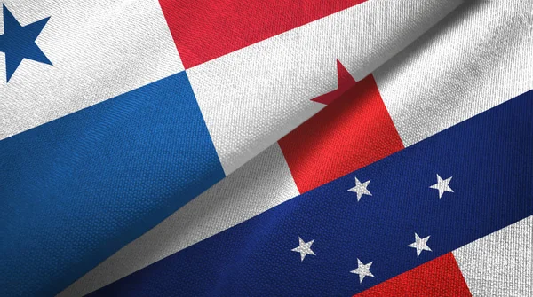 Panamá y las Antillas Holandesas dos banderas tela textil, textura de la tela —  Fotos de Stock