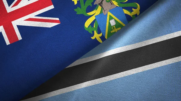 Islas Pitcairn y Botswana dos banderas tela textil, textura de la tela —  Fotos de Stock