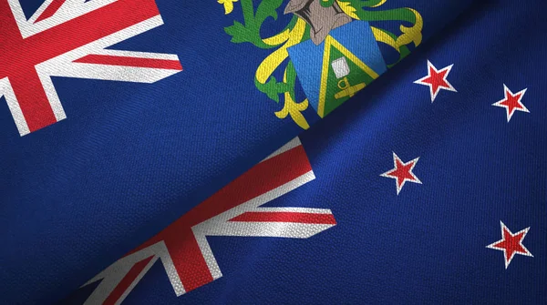 Wyspy Pitcairn i Nowa Zelandia dwie flagi tkaniny tekstylne, tekstura tkaniny — Zdjęcie stockowe
