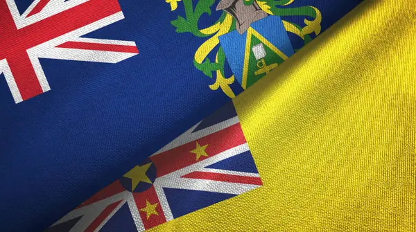 Pitcairn Islands and Niue two flags textile cloth, fabric texture — 图库照片