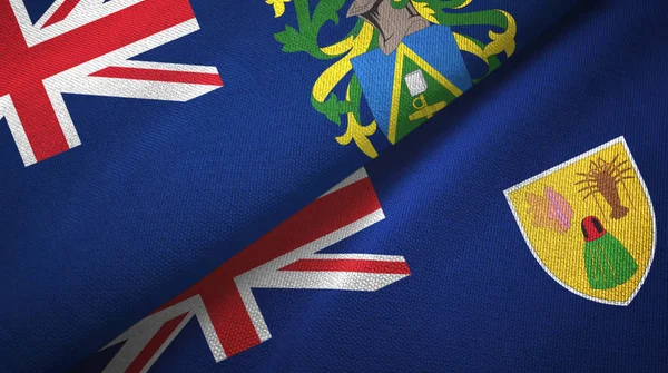Pitcairn îles et îles Turques et Caïques deux drapeaux tissu textile — Photo